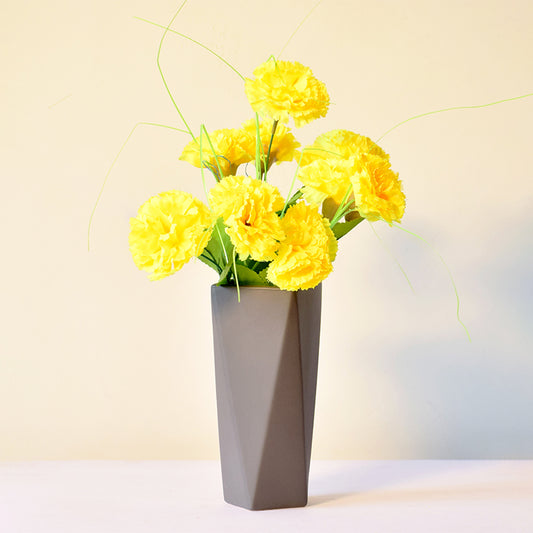 Geometric black vase with flowers
