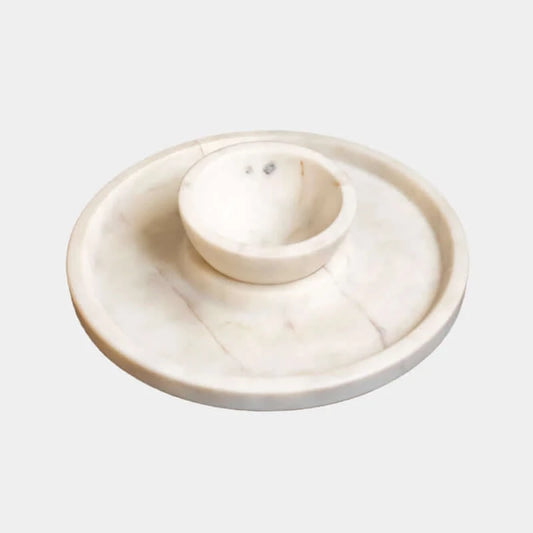 white marble bowl on platter