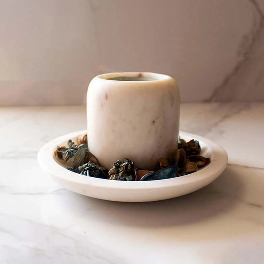 Aromatic candle stand on plate