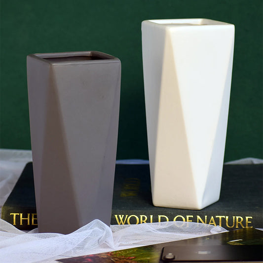 Two geometric ceramic vases