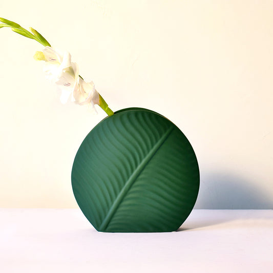 Leaf-shaped dark green flower vase in ceramic 
