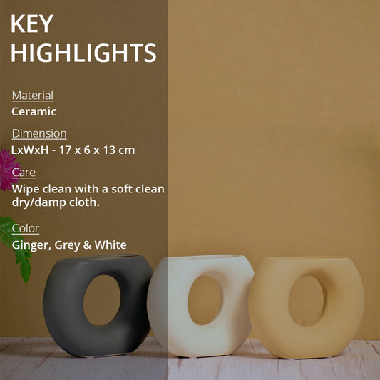 key highlights of a half donut ceramic vase