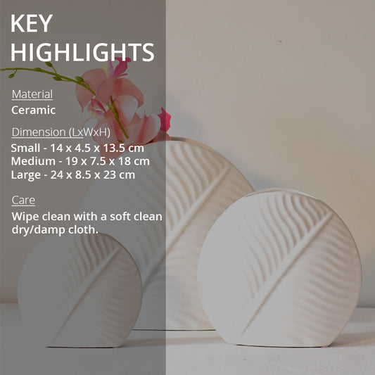 Key highlight of leaf shaped white vase