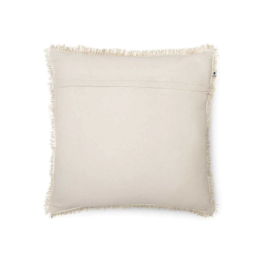 Plain white throw pillow with fringe