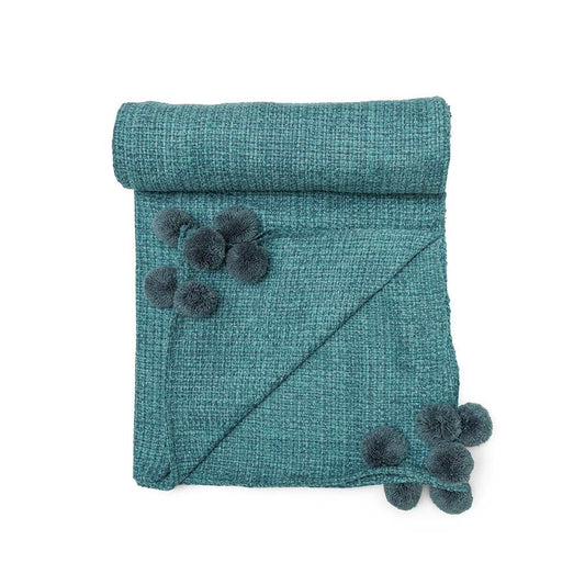 Teal throw with pom pom