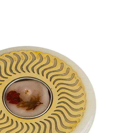 Close view of marble candle holder in disc shape